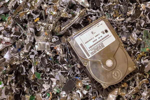 pile of shredded hard drive discs